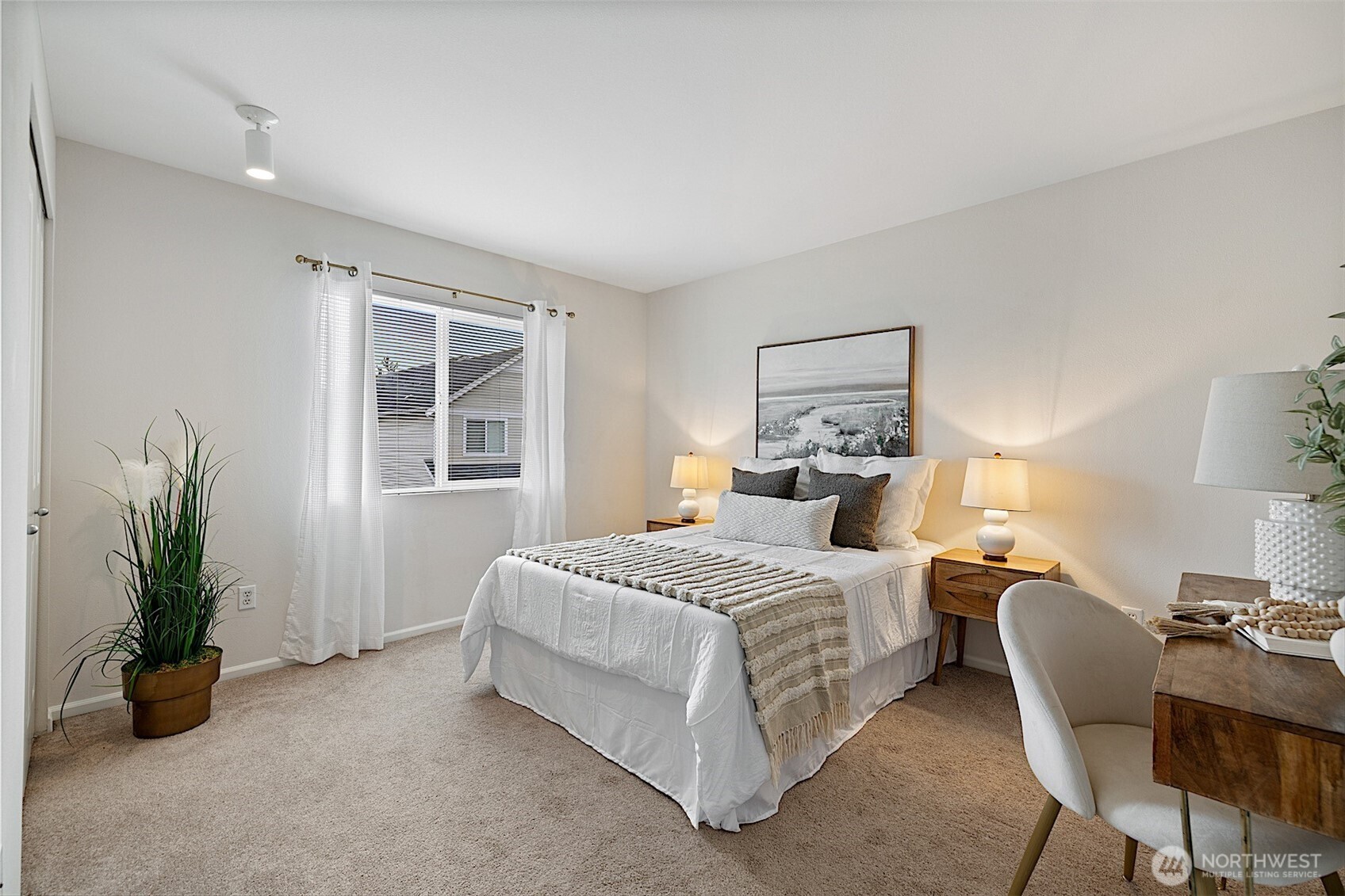 21509 48th Court South, Unit 181 Kent, WA 98032 - Photo 29 of 40 a bedroom with a bed and a couch