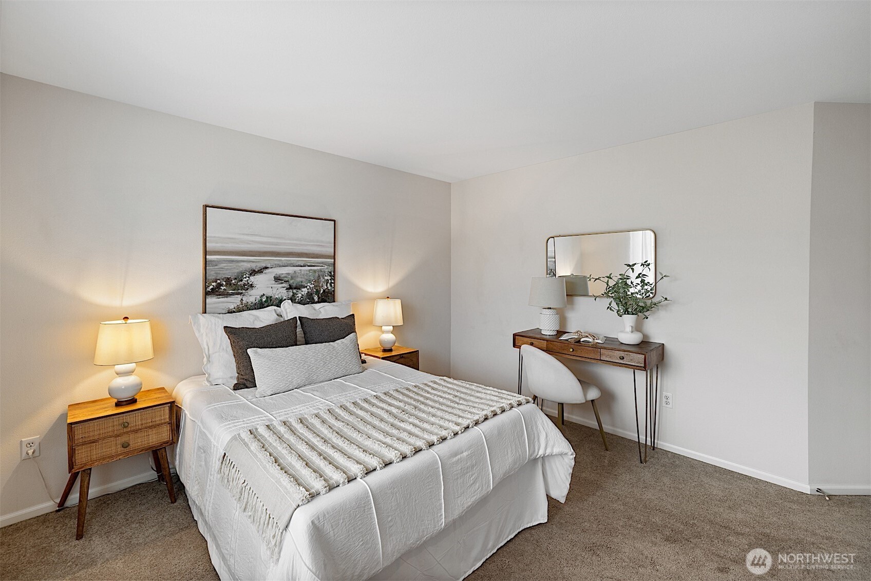 21509 48th Court South, Unit 181 Kent, WA 98032 - Photo 30 of 40 a bedroom with a bed and wooden table