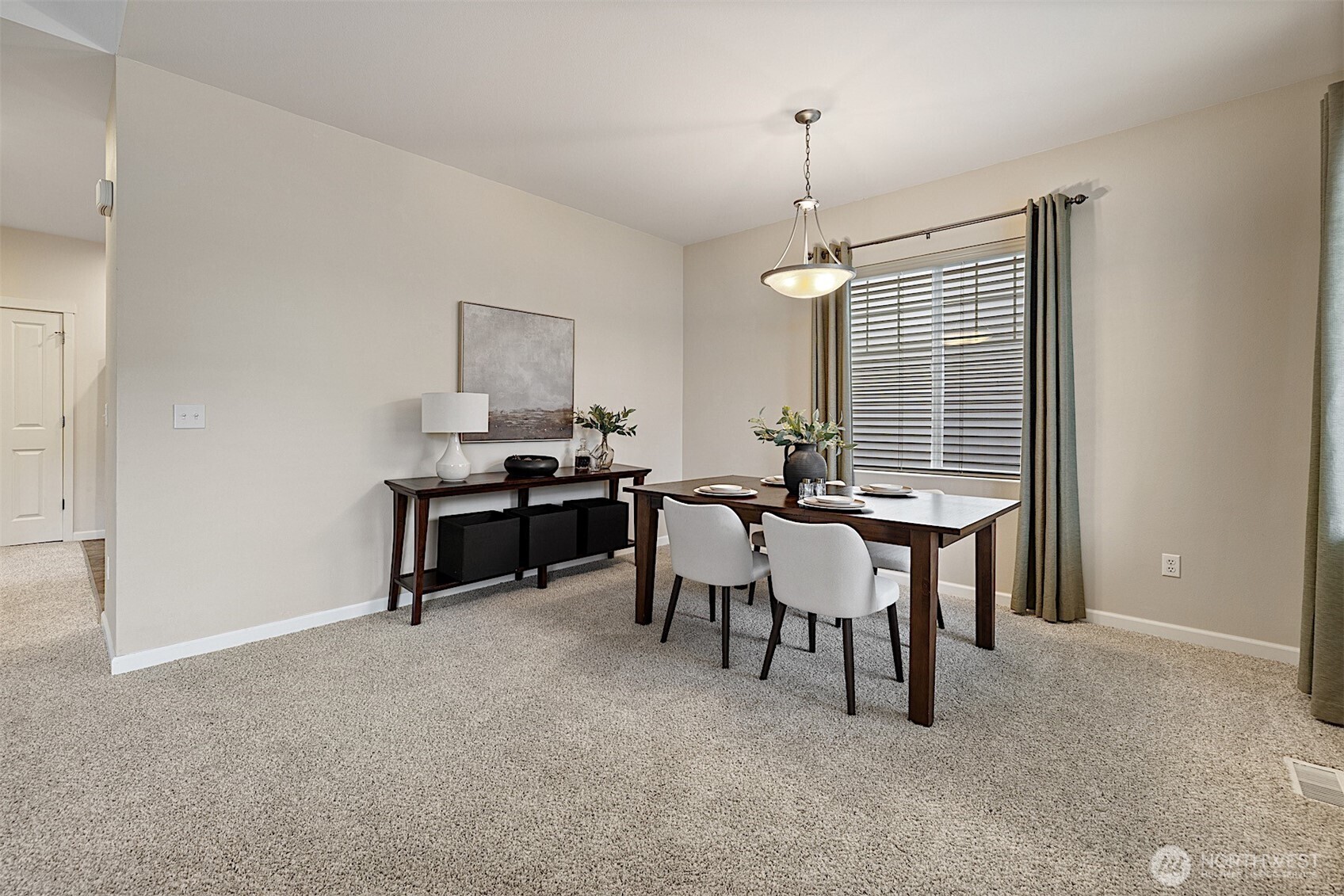 21509 48th Court South, Unit 181 Kent, WA 98032 - Photo 7 of 40 a view of a dining room with furniture and window