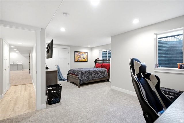 2973 West Red Sand Rd Haven Ogden, UT 84401 - Photo 27 of 30 Spacious room with plush carpeting, recessed lighting, and a window with a privacy blind