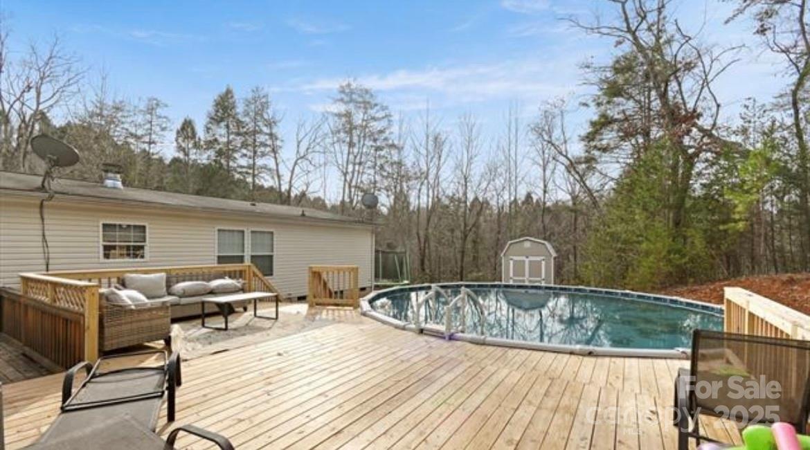 116 Kings Glen Road Old Fort, NC 28762 - Photo 16 of 16 a view of a backyard with sitting area