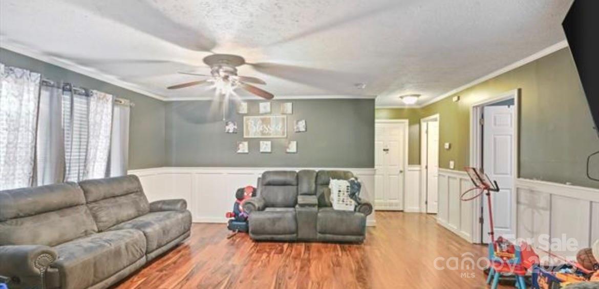 116 Kings Glen Road Old Fort, NC 28762 - Photo 5 of 16 a living room with furniture and a large window