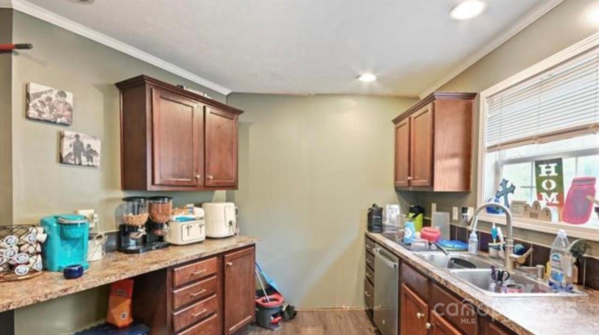 116 Kings Glen Road Old Fort, NC 28762 - Photo 8 of 16 a kitchen with sink cabinets and window