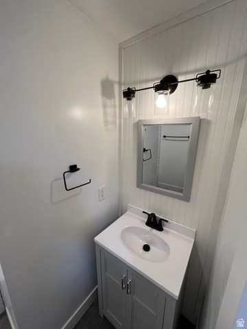 6884 670 East Midvale, UT 84047 - Photo 16 of 28 Bathroom featuring vanity and baseboards