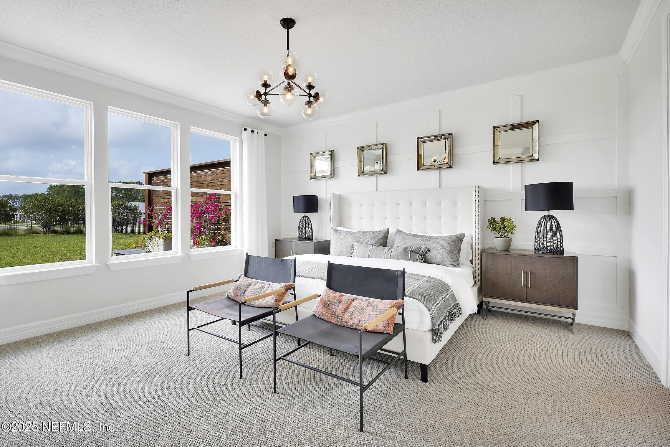334 Continuum Loop Yulee, FL 32097 - Photo 10 of 37 a living room with furniture and a chandelier