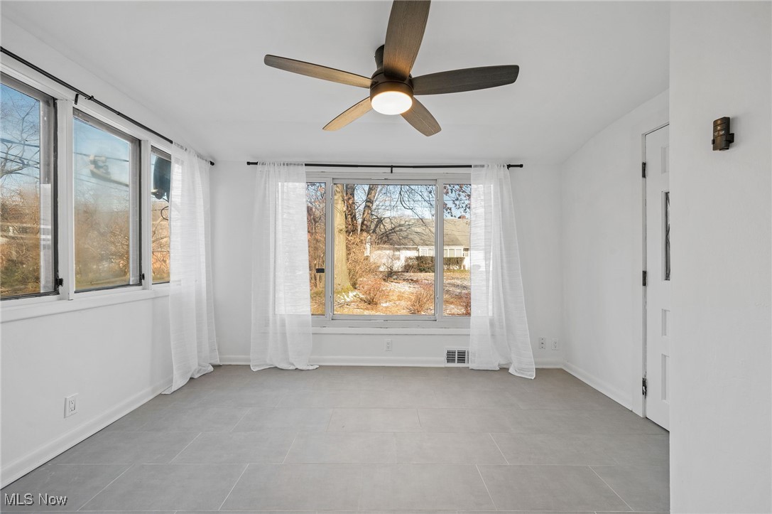 15857 Henley Road Cleveland, OH 44112 - Photo 5 of 42 Spare room featuring ceiling fan