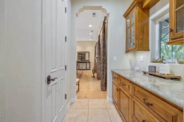 a view of house with outdoor space and garden