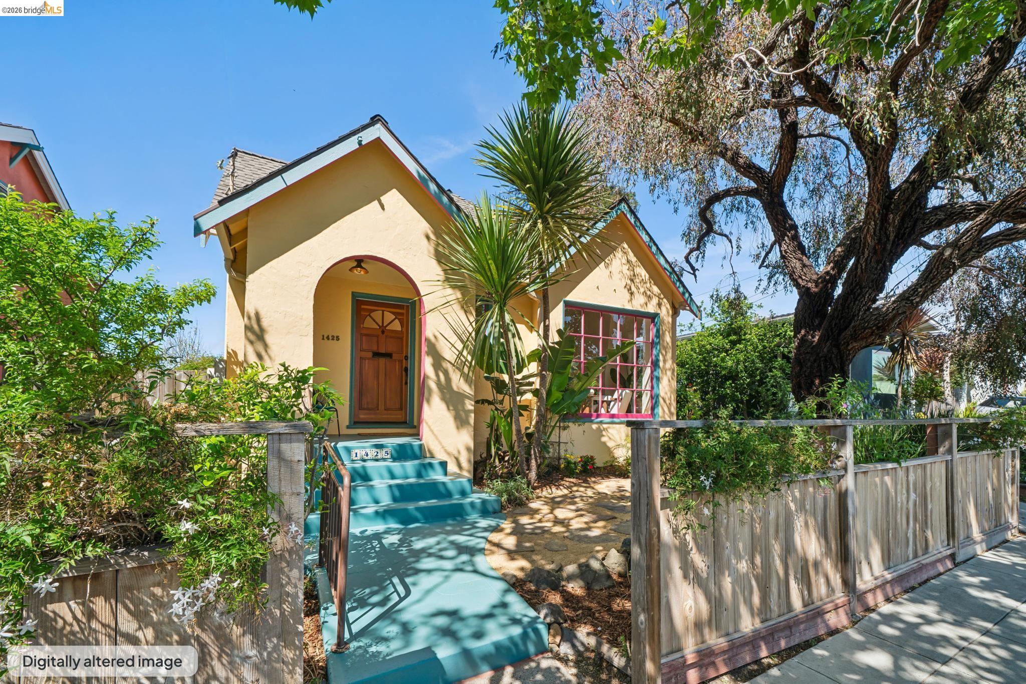 a front view of a house with garden