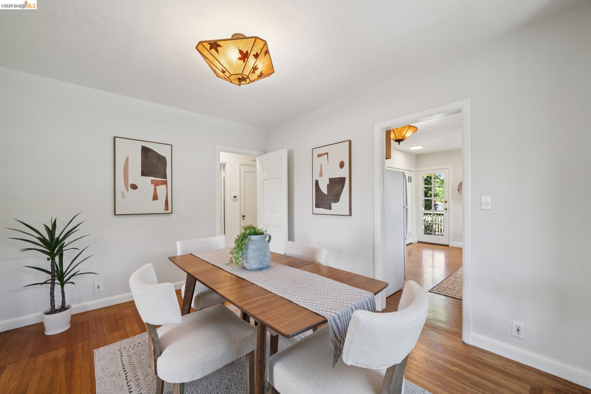 1425 Virginia Street Berkeley, CA 94702 - Photo 11 of 42 a view of a dining room with furniture and wooden floor