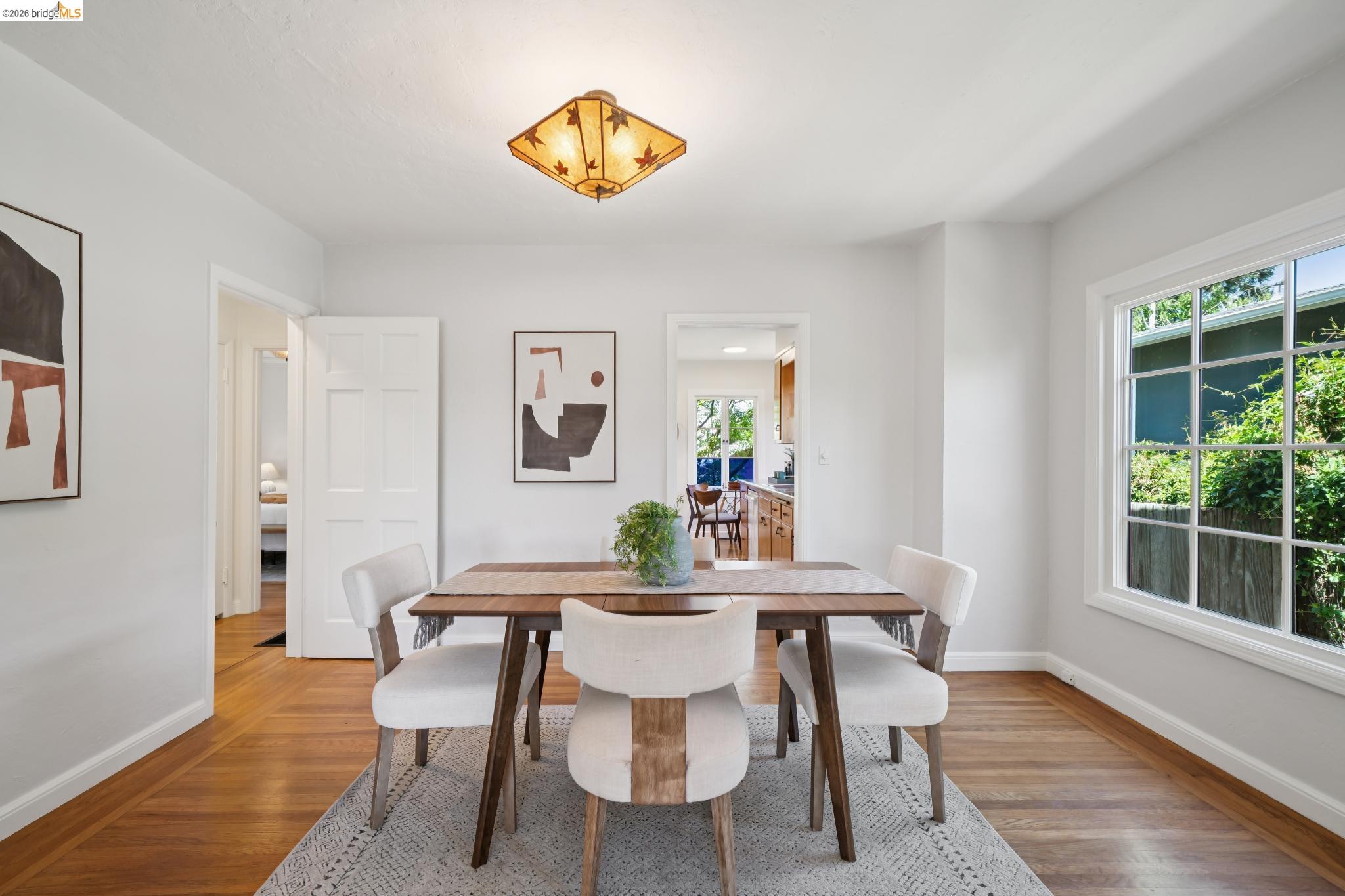 1425 Virginia Street Berkeley, CA 94702 - Photo 14 of 42 a view of a dining room with furniture and wooden floor