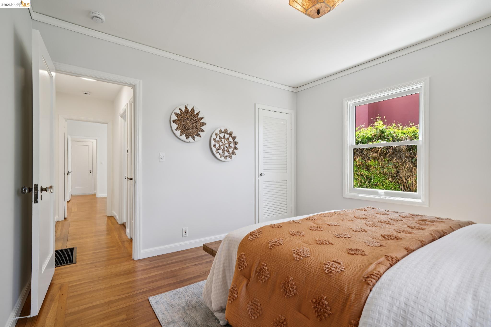 1425 Virginia Street Berkeley, CA 94702 - Photo 26 of 42 a bedroom with a bed and a window