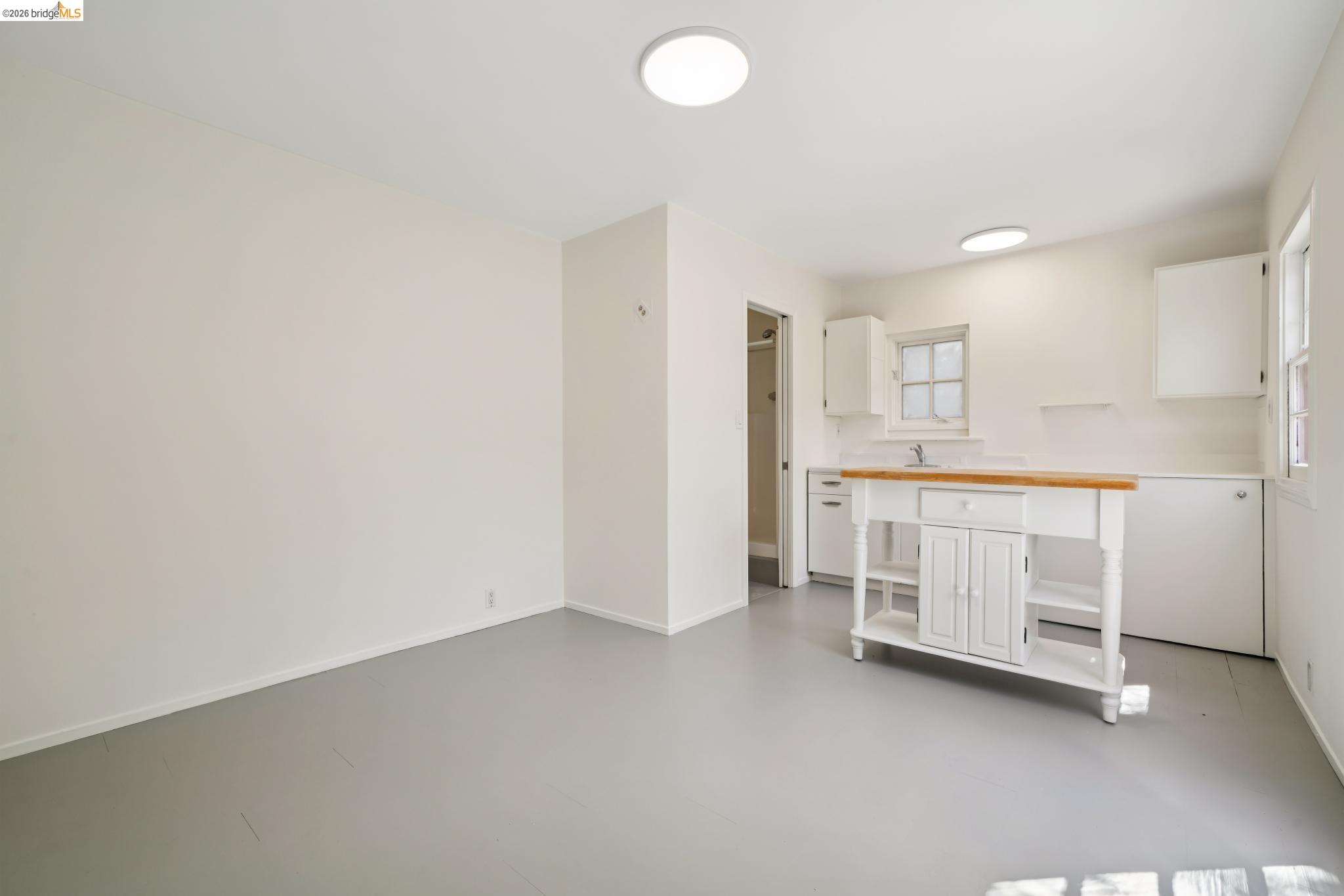 1425 Virginia Street Berkeley, CA 94702 - Photo 33 of 42 a room with a baby crib and a dresser