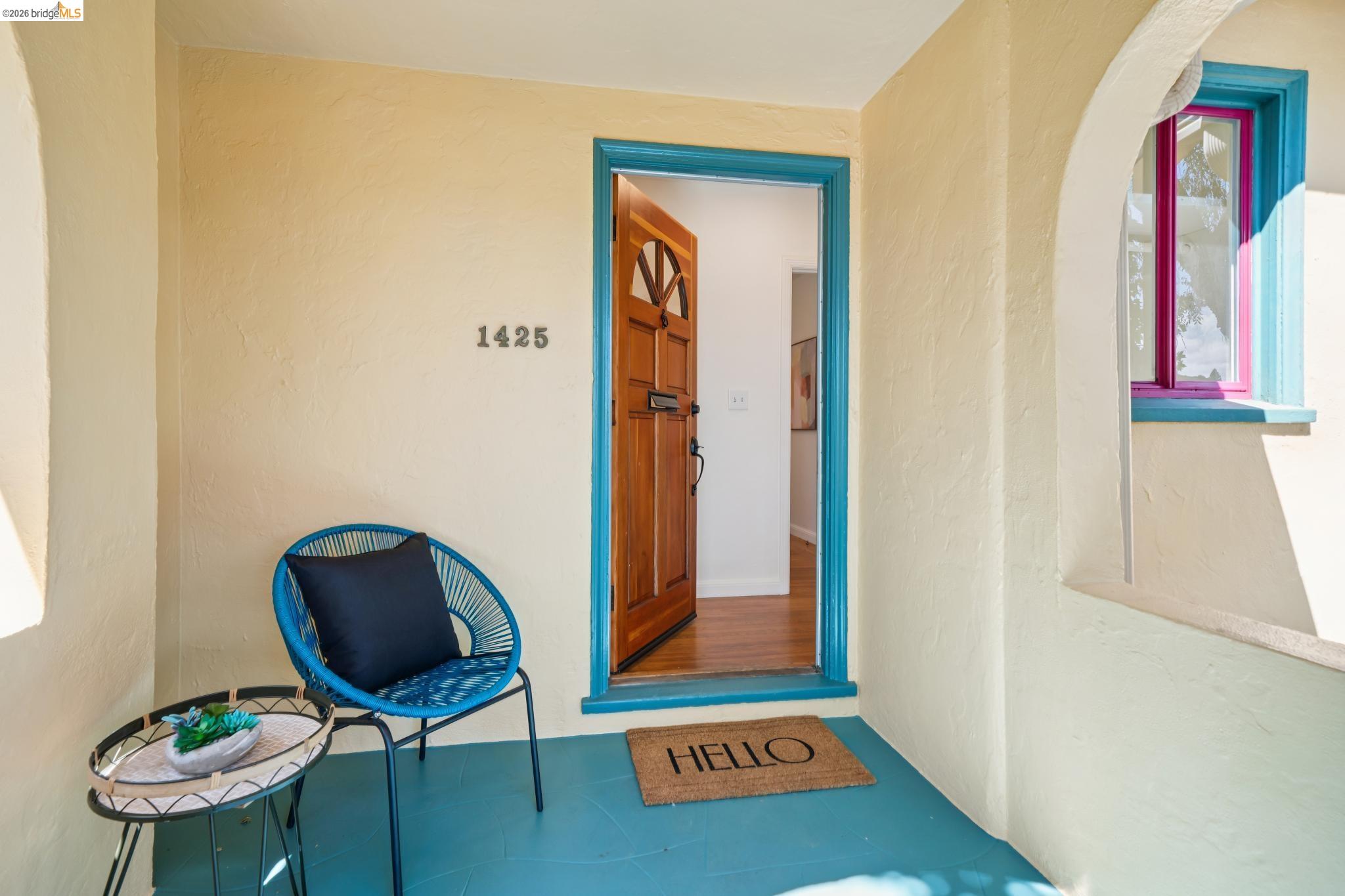 1425 Virginia Street Berkeley, CA 94702 - Photo 5 of 42 a living room with furniture and a painting on the wall