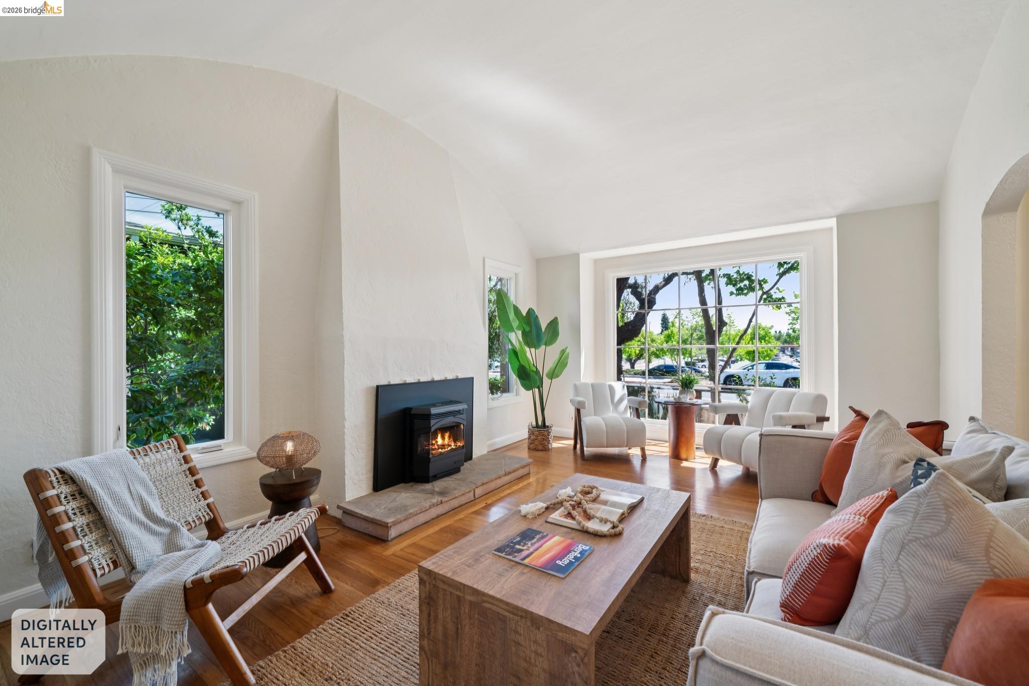 1425 Virginia Street Berkeley, CA 94702 - Photo 9 of 42 a living room with furniture potted plant and a fireplace