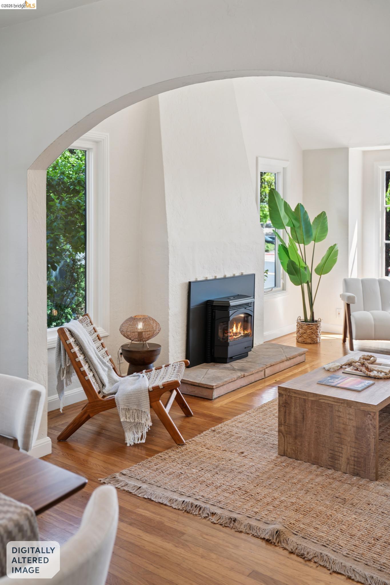 1425 Virginia Street Berkeley, CA 94702 - Photo 10 of 42 a living room with furniture a window and a fireplace