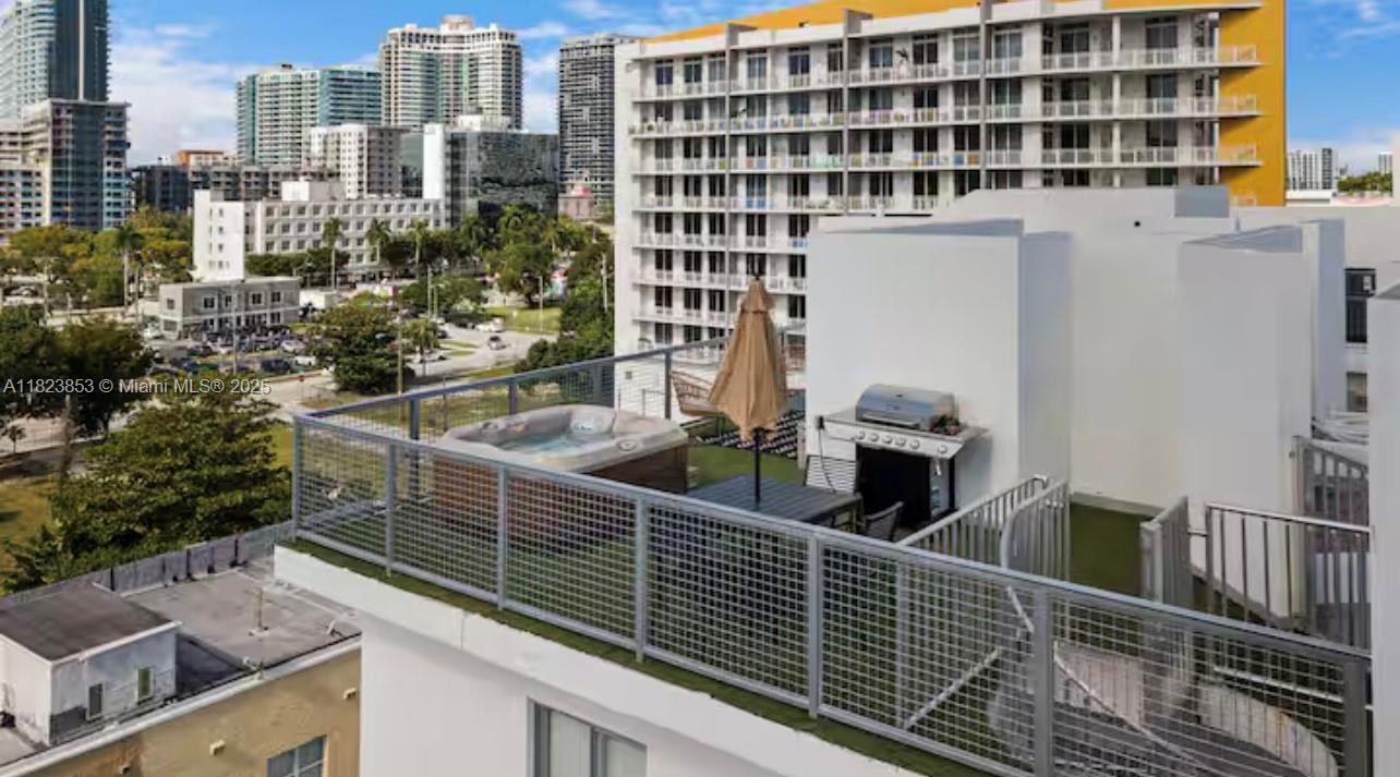 481 Northeast 29th Street, Unit 706 Miami, FL 33137 - Photo 3 of 26 a view of a balcony with city view