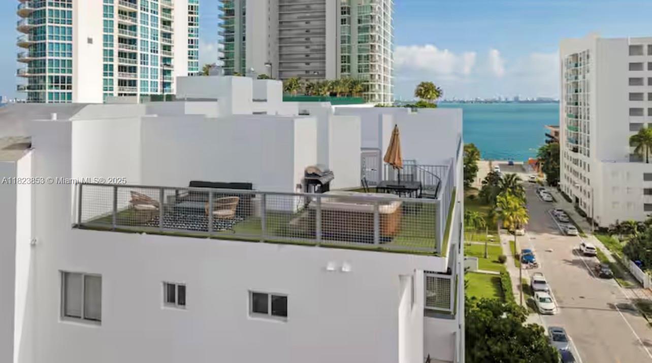 481 Northeast 29th Street, Unit 706 Miami, FL 33137 - Photo 4 of 26 a view of balcony with a yard and seating space