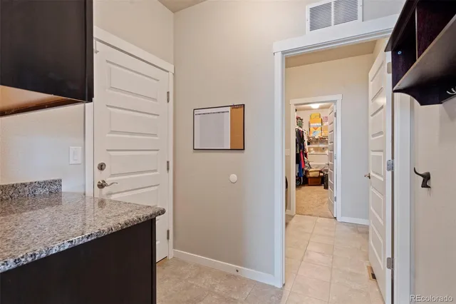 a view of a bathroom from a hallway