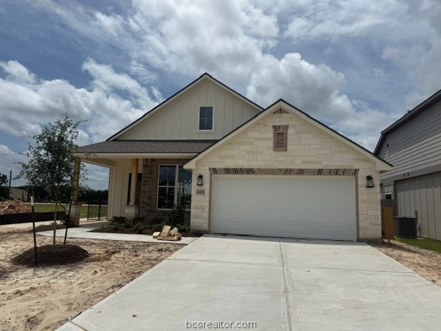 6428 Raleigh Loop College Station, TX 77845 - Photo 2 of 20 a front view of a house with a yard