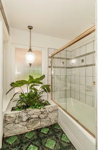 a view of a lake with houses and trees