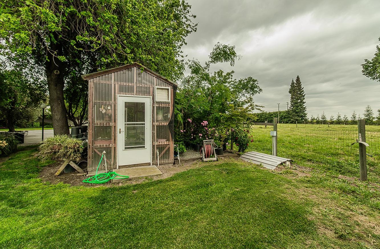 3670 South Newmark Avenue Sanger, CA 93657 - Photo 67 of 98 a view of backyard with a garden and entertaining space