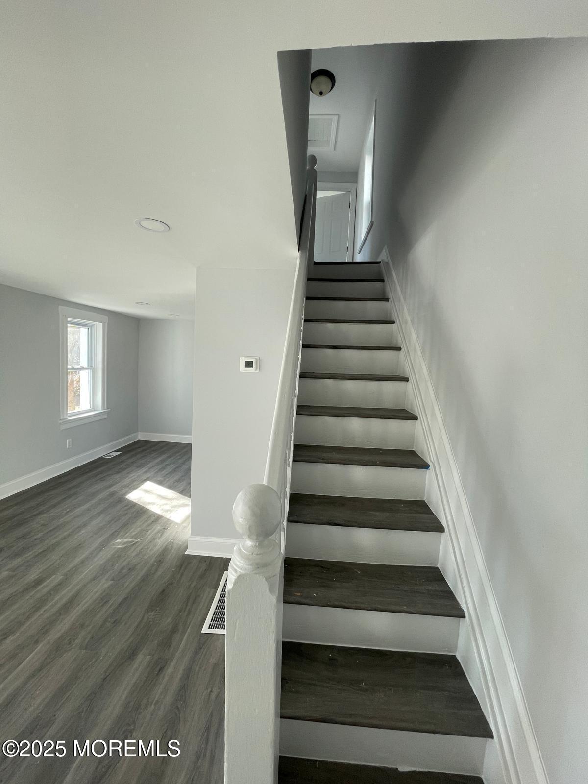 405 Myrtle Avenue Neptune Township, NJ 07753 - Photo 3 of 20 a view of entryway and hall with wooden floor