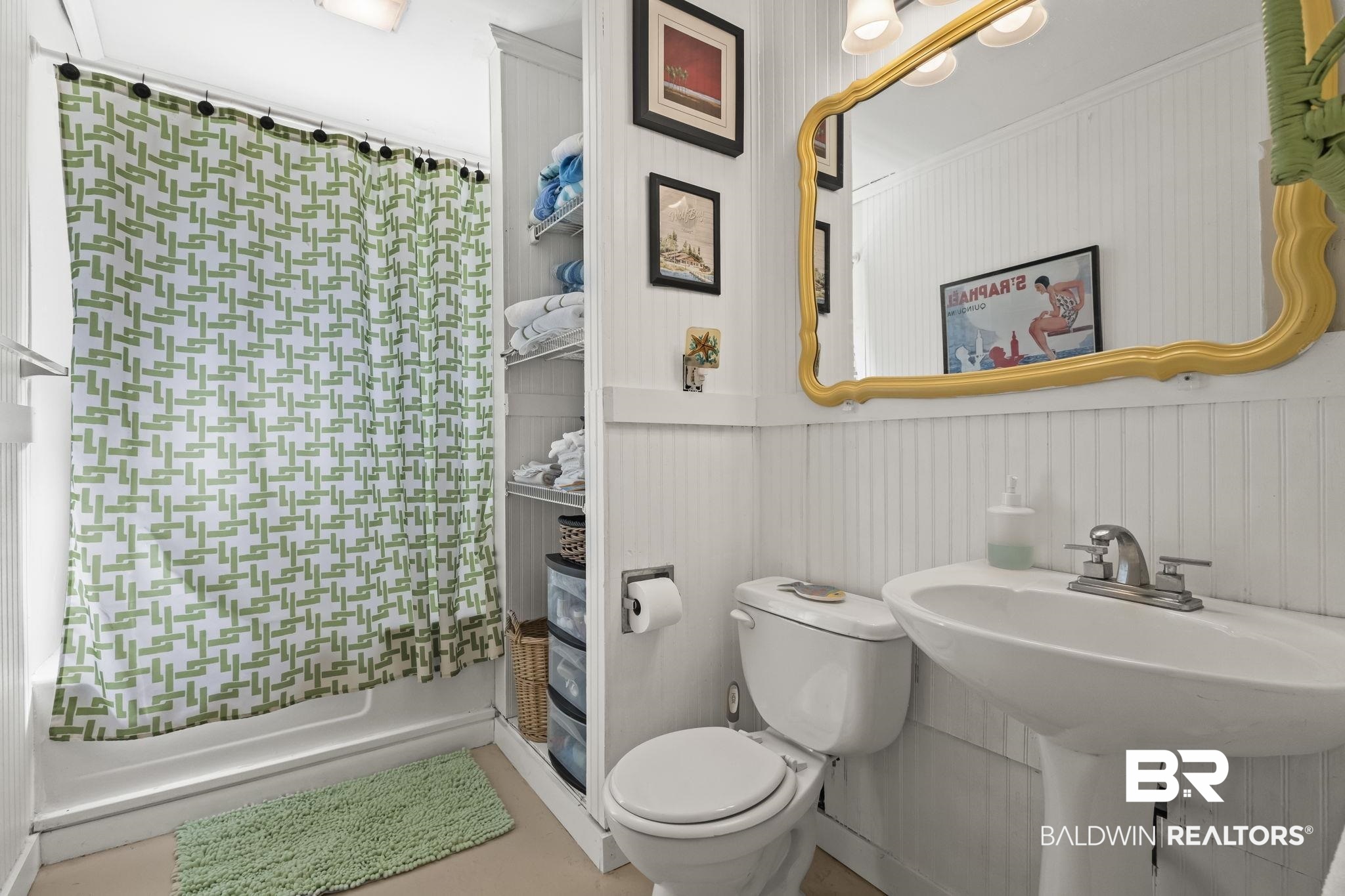 7849 Bayshore Drive Elberta, AL 36530 - Photo 30 of 47 Full bathroom with sink, toilet, and shower / tub combo with curtain