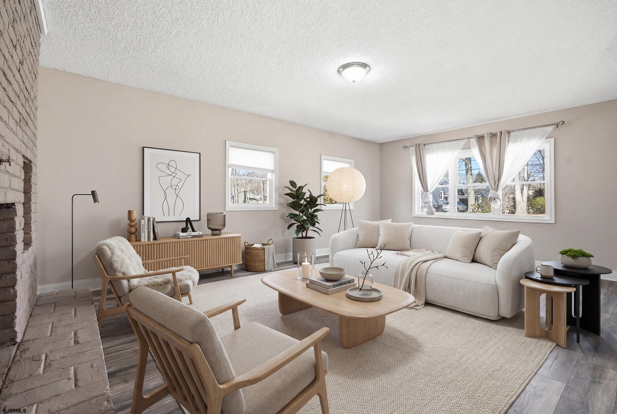 1103 Chelsea Road Absecon, NJ 08201 - Photo 17 of 34 a living room with furniture and a large window