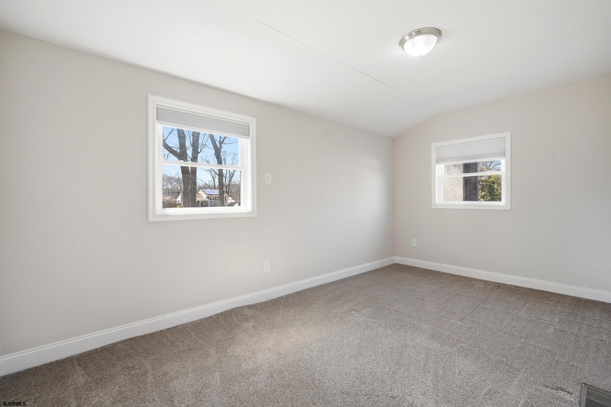 1103 Chelsea Road Absecon, NJ 08201 - Photo 20 of 34 an empty room with a window