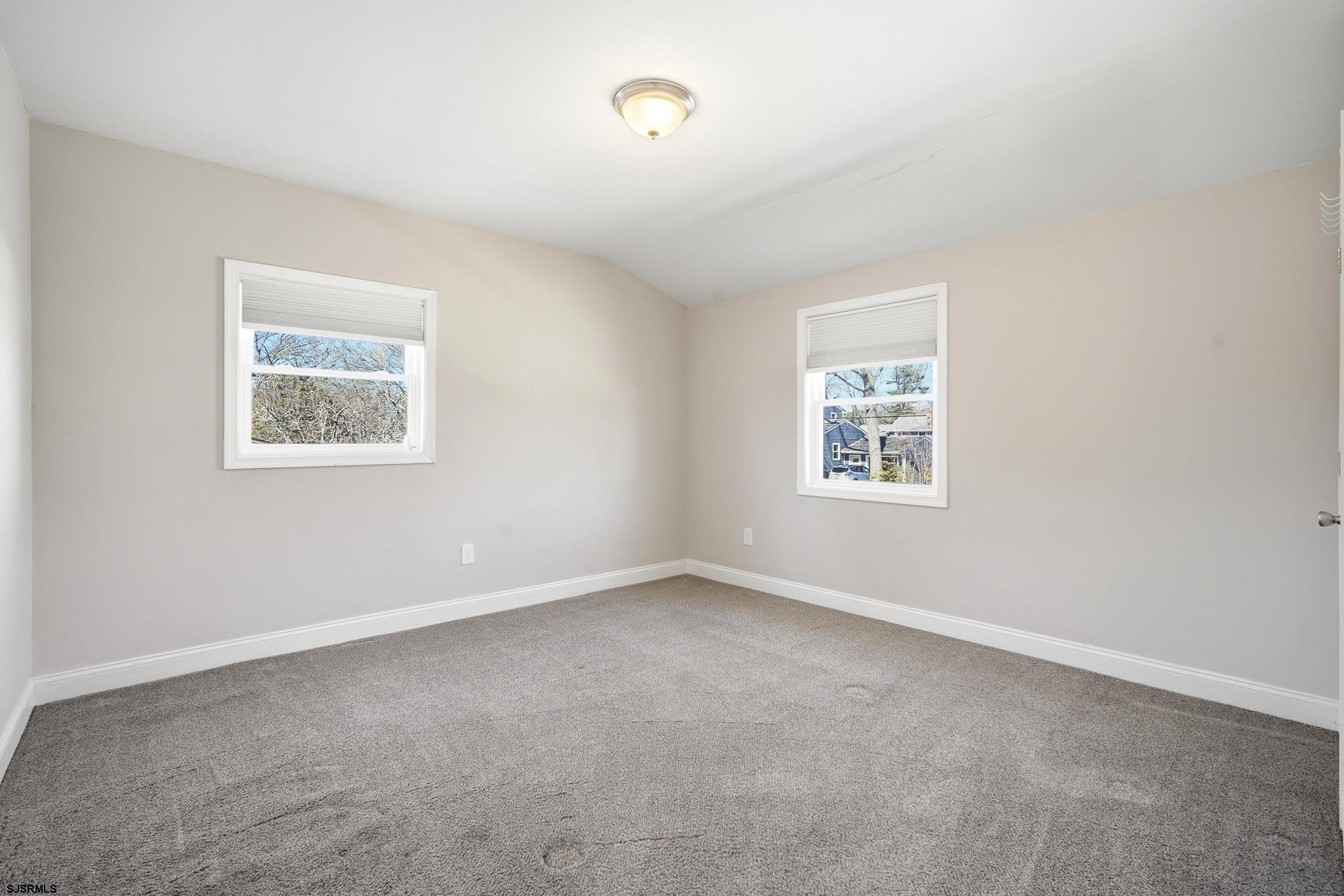 1103 Chelsea Road Absecon, NJ 08201 - Photo 21 of 34 an empty room with a window