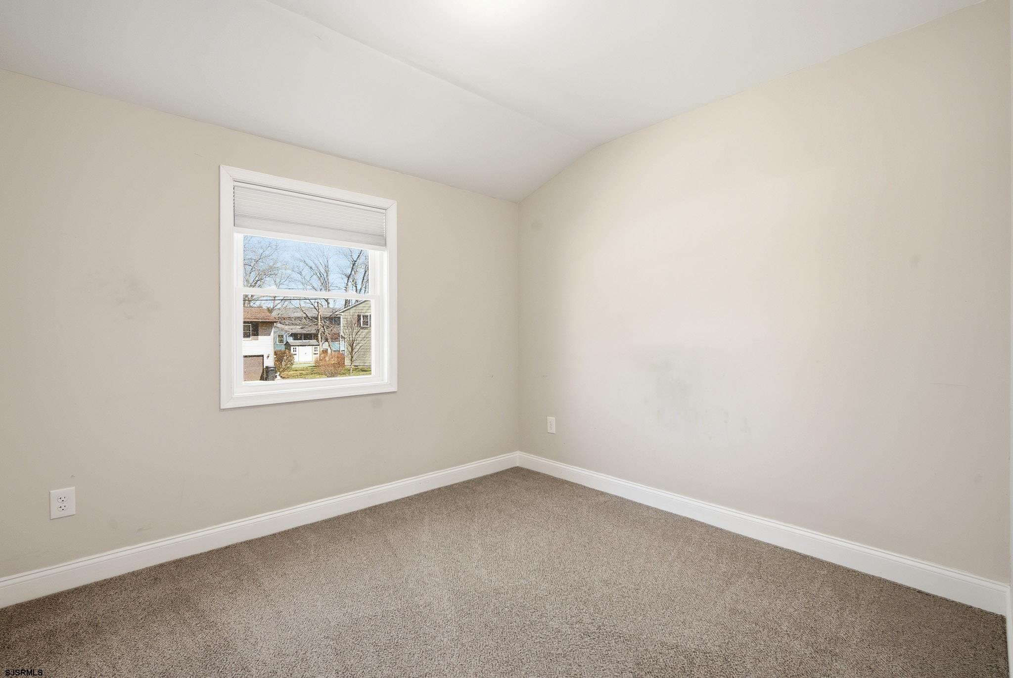 1103 Chelsea Road Absecon, NJ 08201 - Photo 22 of 34 an empty room with a window
