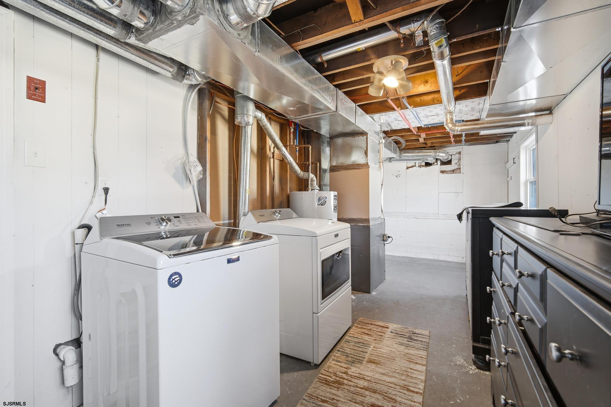1103 Chelsea Road Absecon, NJ 08201 - Photo 24 of 34 a utility room with dryer and washer