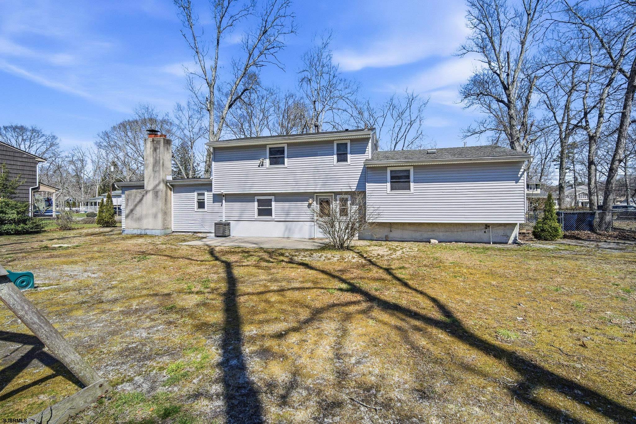1103 Chelsea Road Absecon, NJ 08201 - Photo 4 of 34 a view of a house with snow on the side of the house