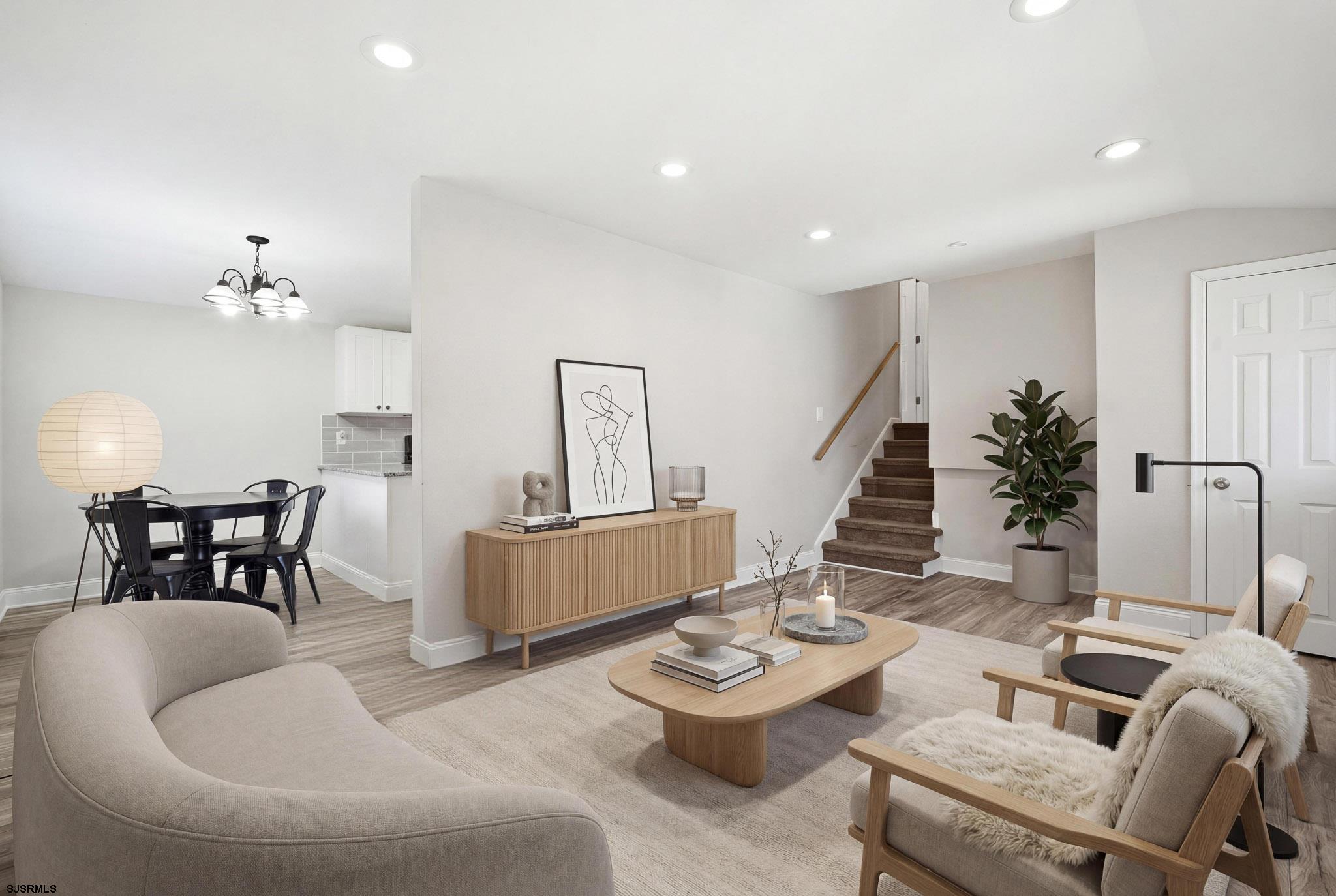 1103 Chelsea Road Absecon, NJ 08201 - Photo 9 of 34 a living room with furniture and wooden floor