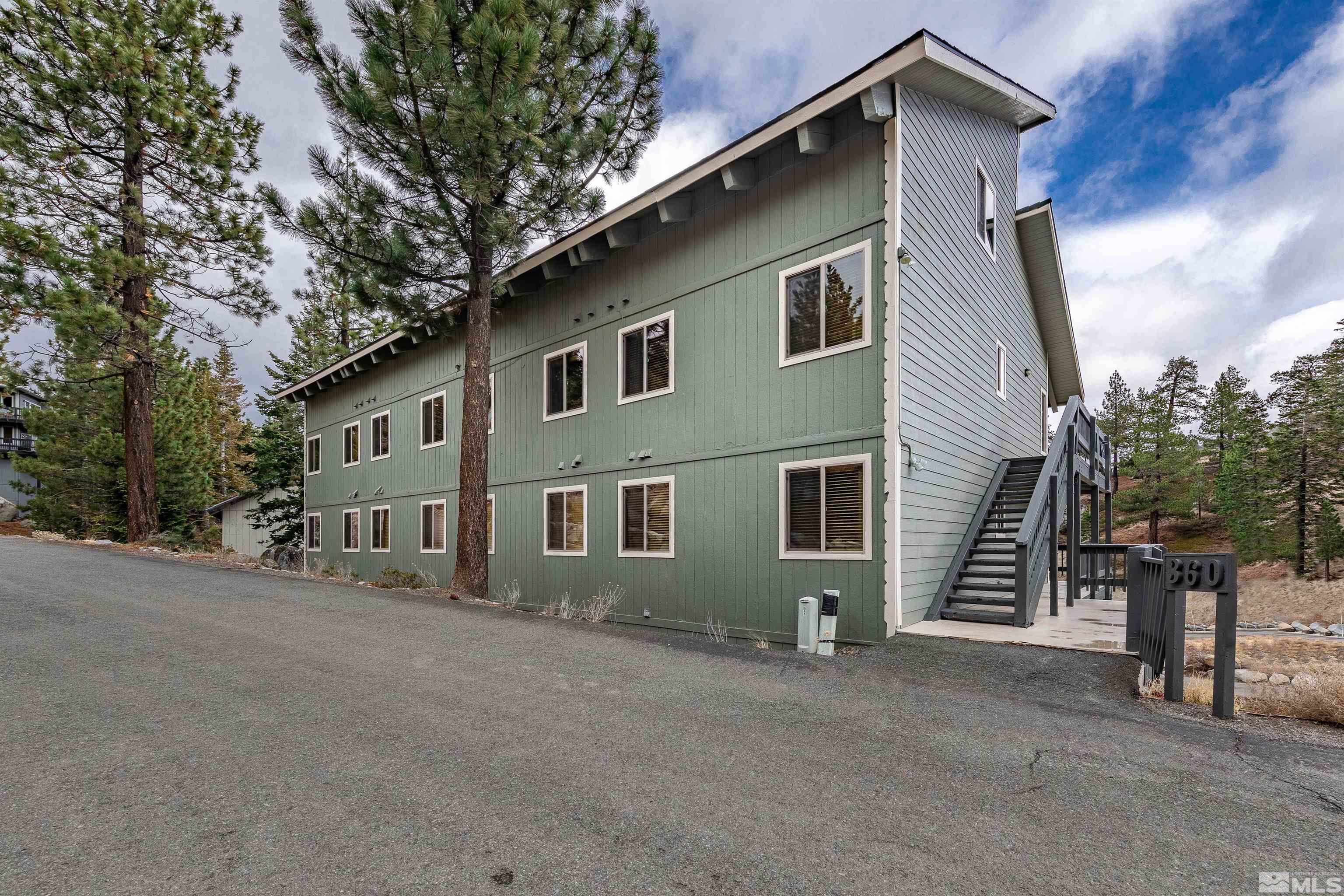 360 Galaxy Lane, Unit 2 (B) Stateline, NV 89449 - Photo 11 of 22 a front view of a house with garage