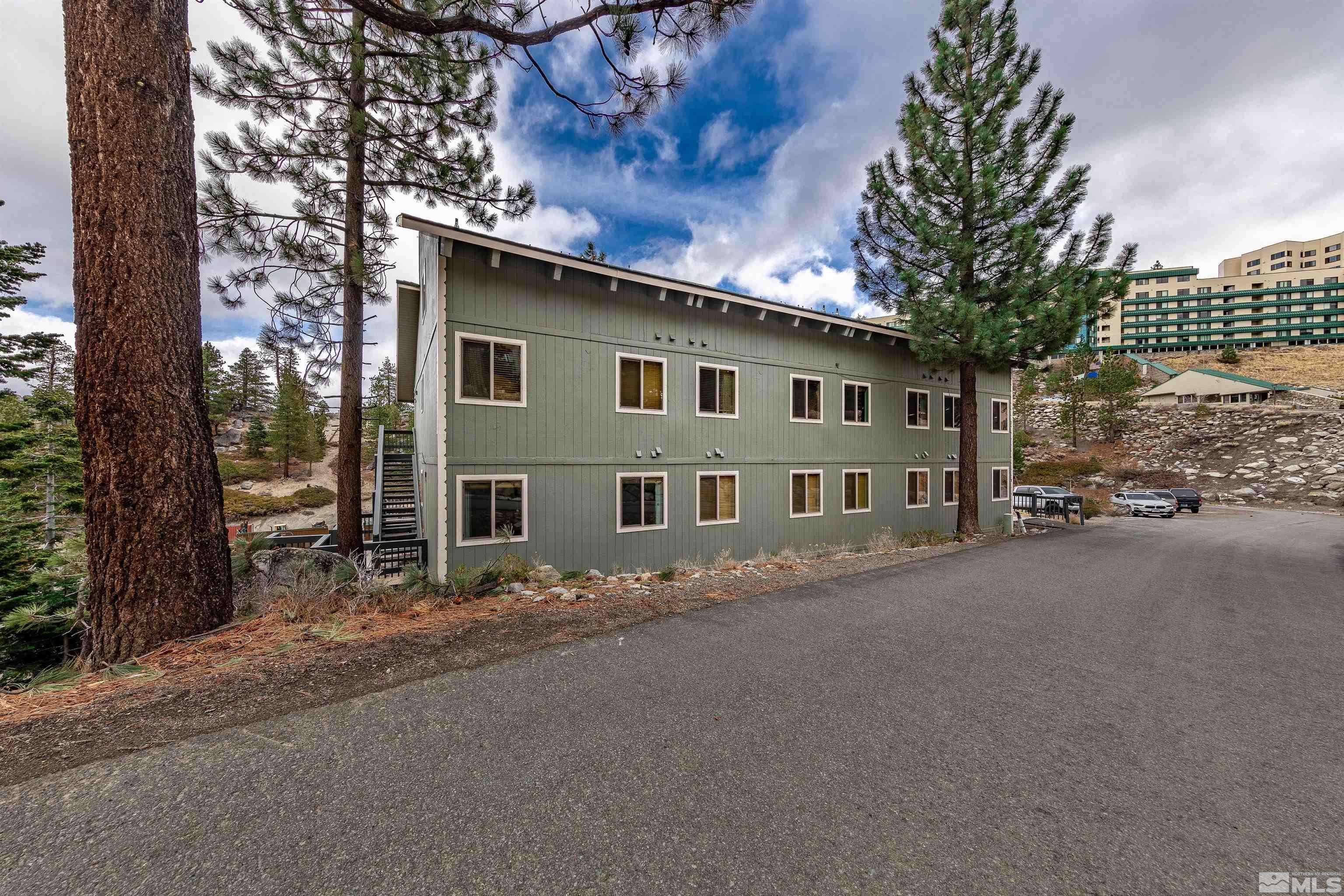 360 Galaxy Lane, Unit 2 (B) Stateline, NV 89449 - Photo 13 of 22 a front view of a house with a yard