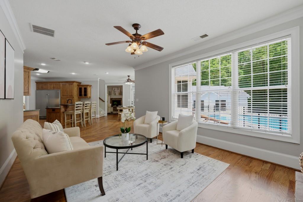 582 Knox Chapel Road Social Circle, GA 30025 - Photo 14 of 49 a living room with furniture and a large window