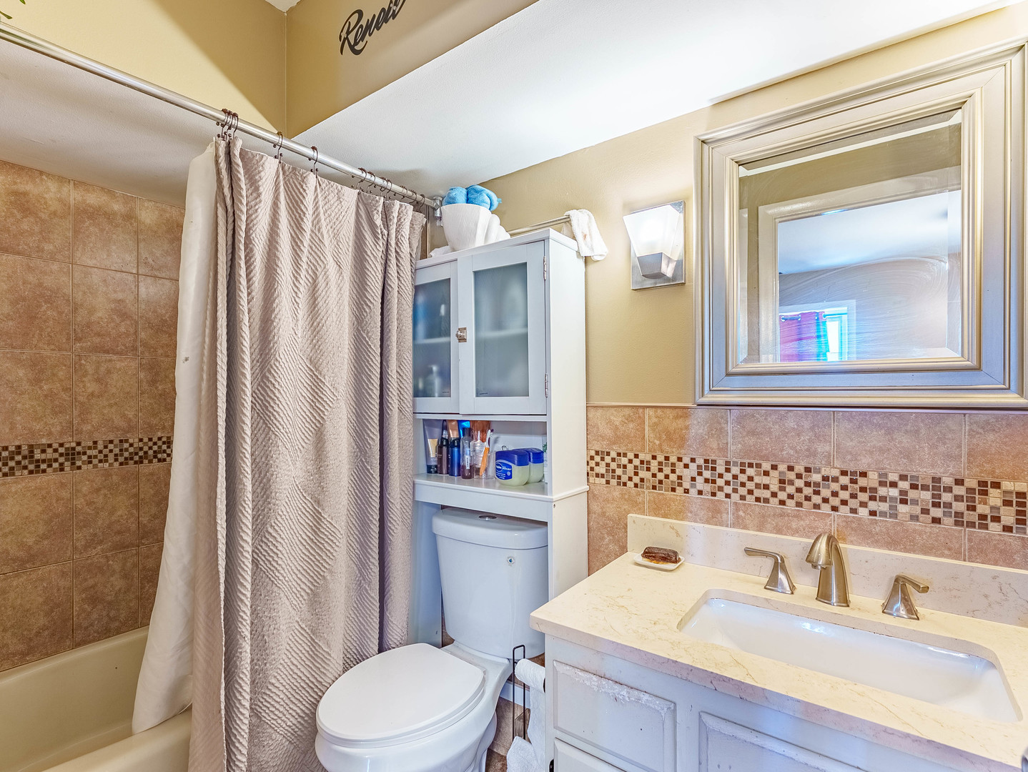 6337 Roosevelt Road, Unit 309 Berwyn, IL 60402 - Photo 11 of 27 a bathroom with a sink toilet and shower