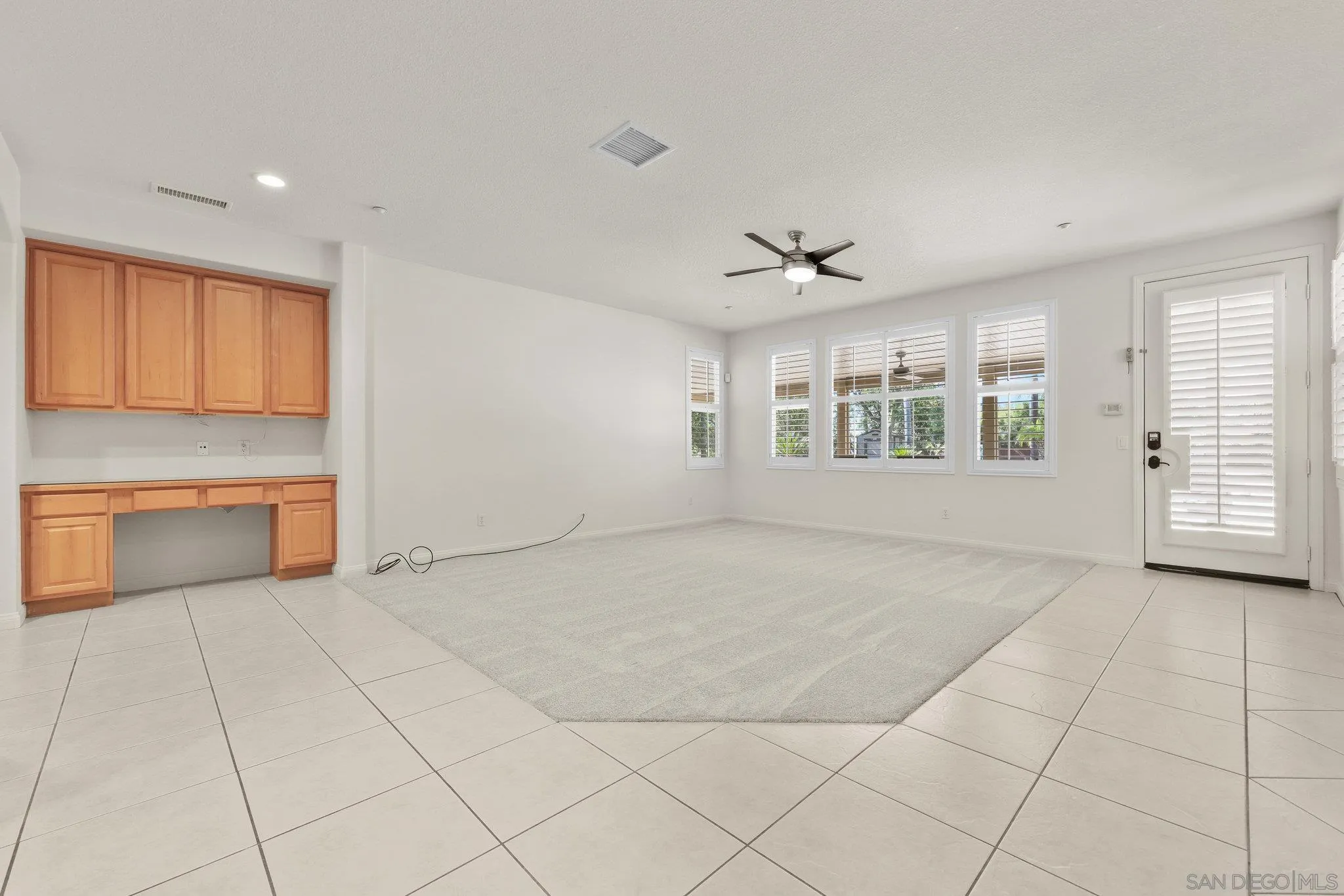 824 Hillcrest Terrace Fallbrook, CA 92028 - Photo 12 of 47 a view of an empty room with a window