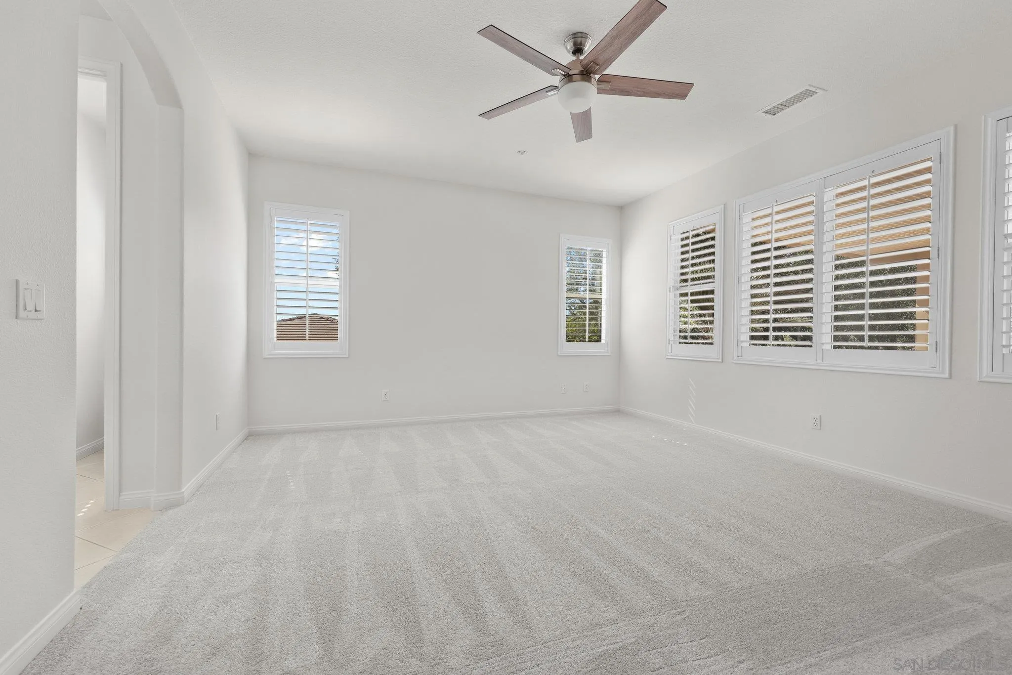 824 Hillcrest Terrace Fallbrook, CA 92028 - Photo 18 of 47 a view of an empty room with a window