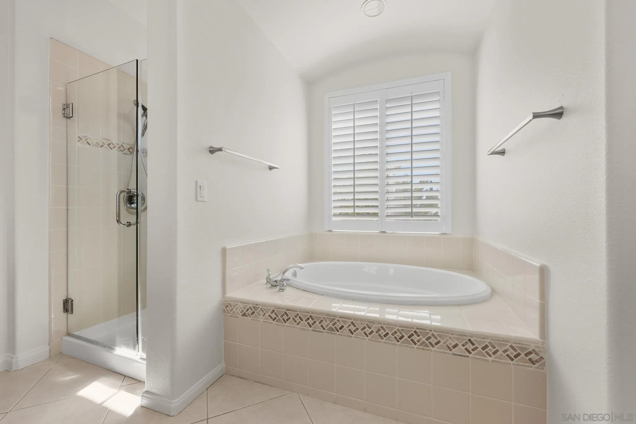 824 Hillcrest Terrace Fallbrook, CA 92028 - Photo 21 of 47 a spacious bathroom with a granite countertop tub shower and a sink
