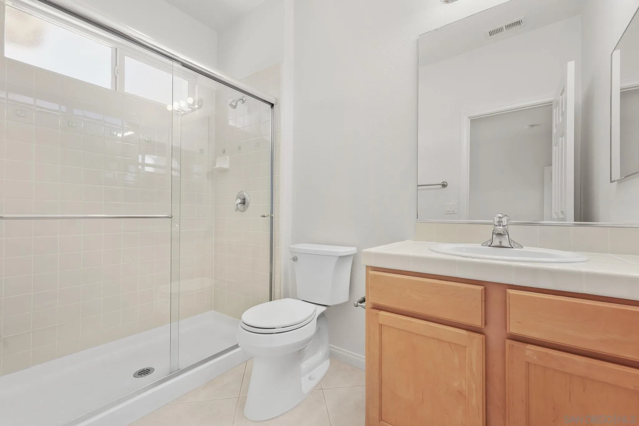 824 Hillcrest Terrace Fallbrook, CA 92028 - Photo 31 of 47 a bathroom with a sink a toilet and shower