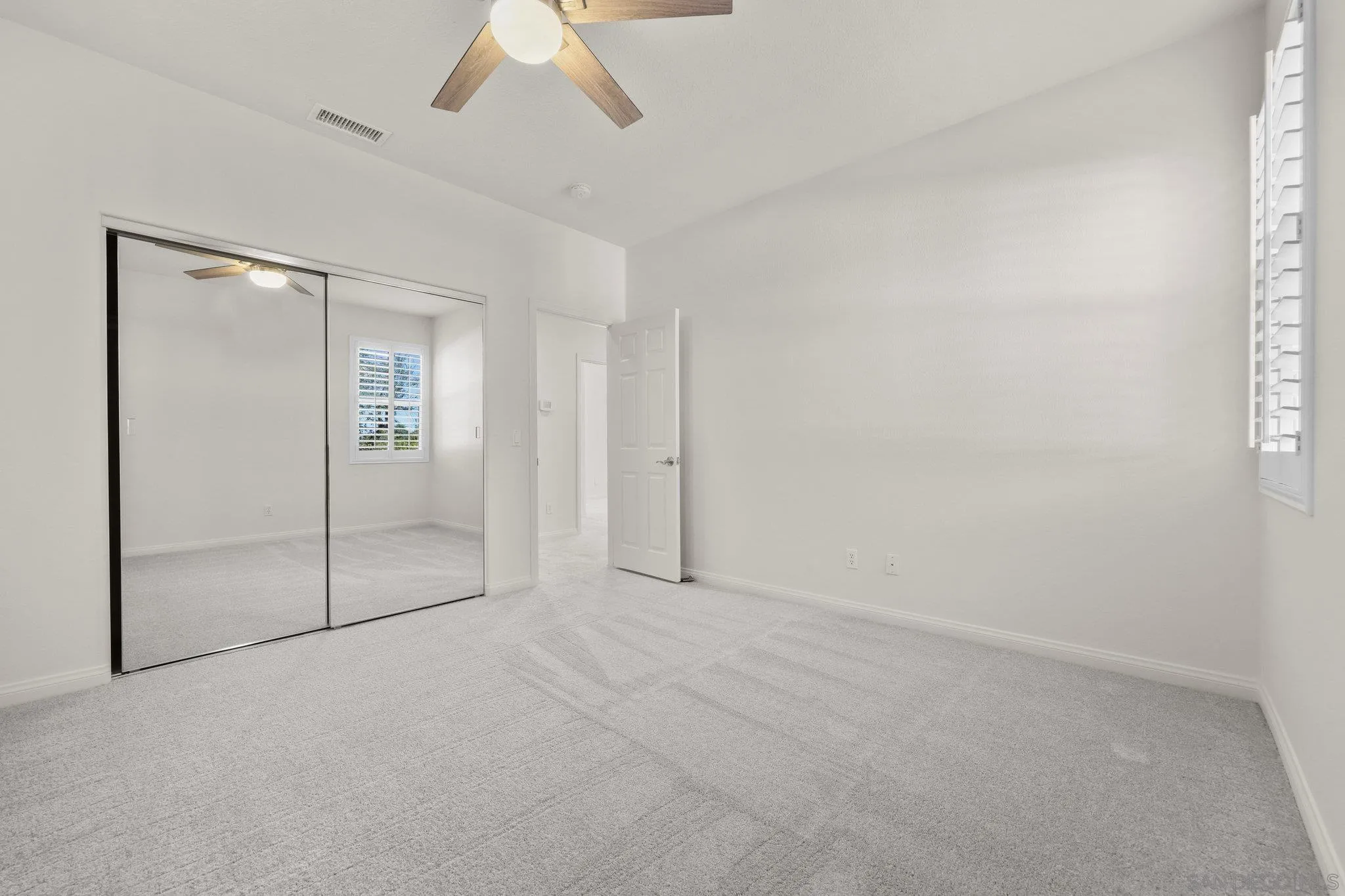 824 Hillcrest Terrace Fallbrook, CA 92028 - Photo 33 of 47 an empty room with fan and entrance