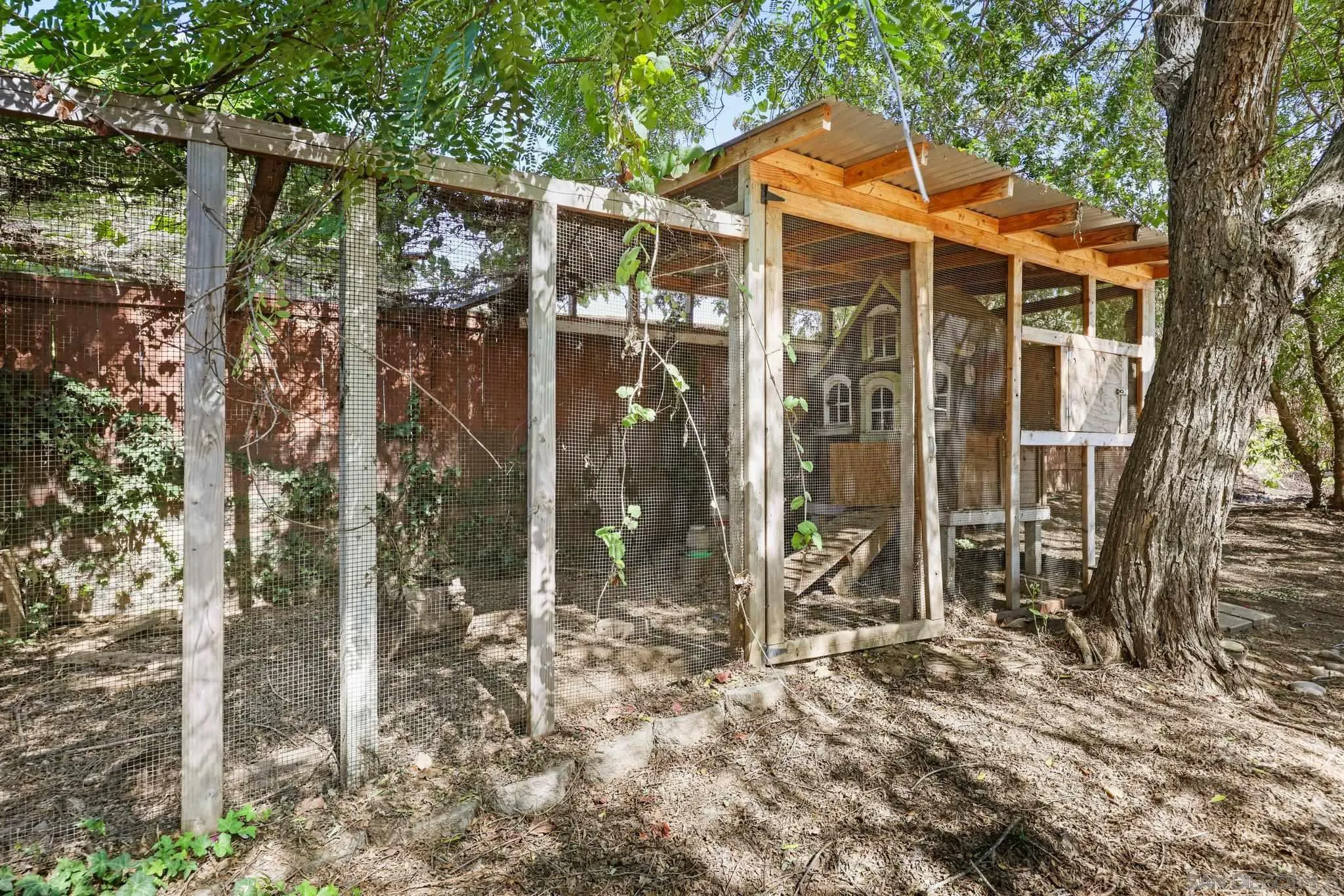 824 Hillcrest Terrace Fallbrook, CA 92028 - Photo 41 of 47 a view of a wooden door with a yard
