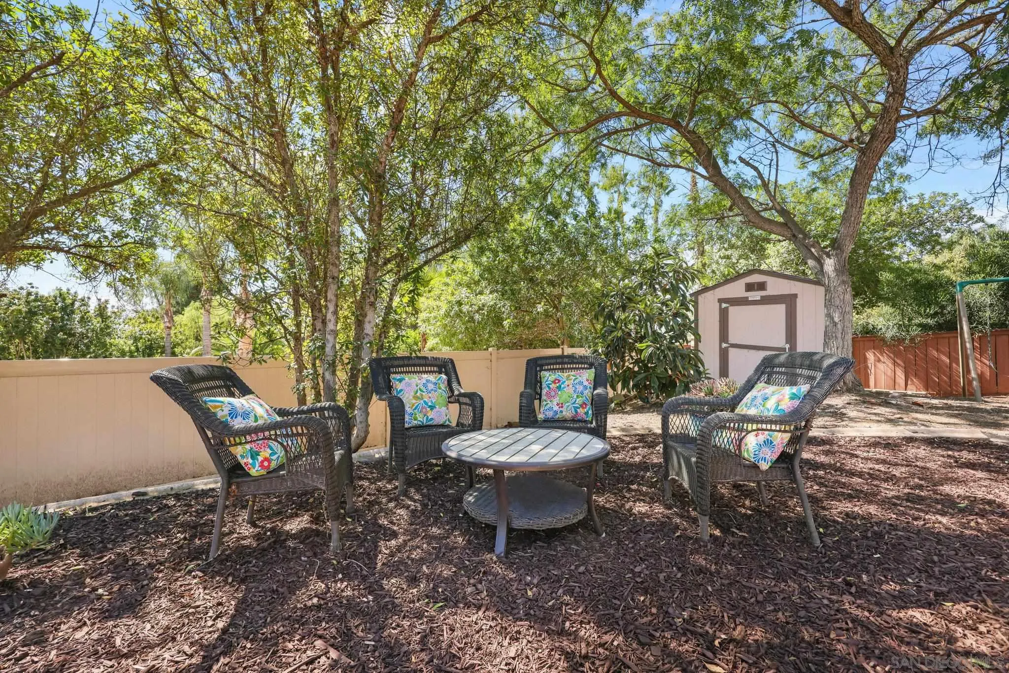 824 Hillcrest Terrace Fallbrook, CA 92028 - Photo 42 of 47 a view of a patio with a table and chairs