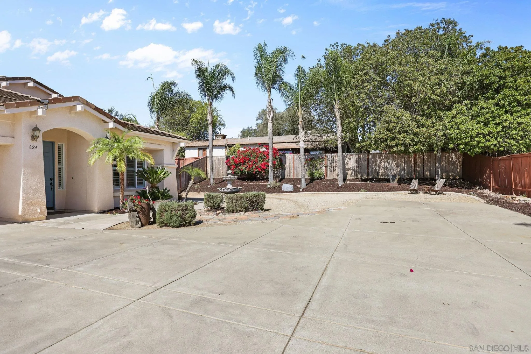 824 Hillcrest Terrace Fallbrook, CA 92028 - Photo 45 of 47 a view of a terrace with a bench and trees around