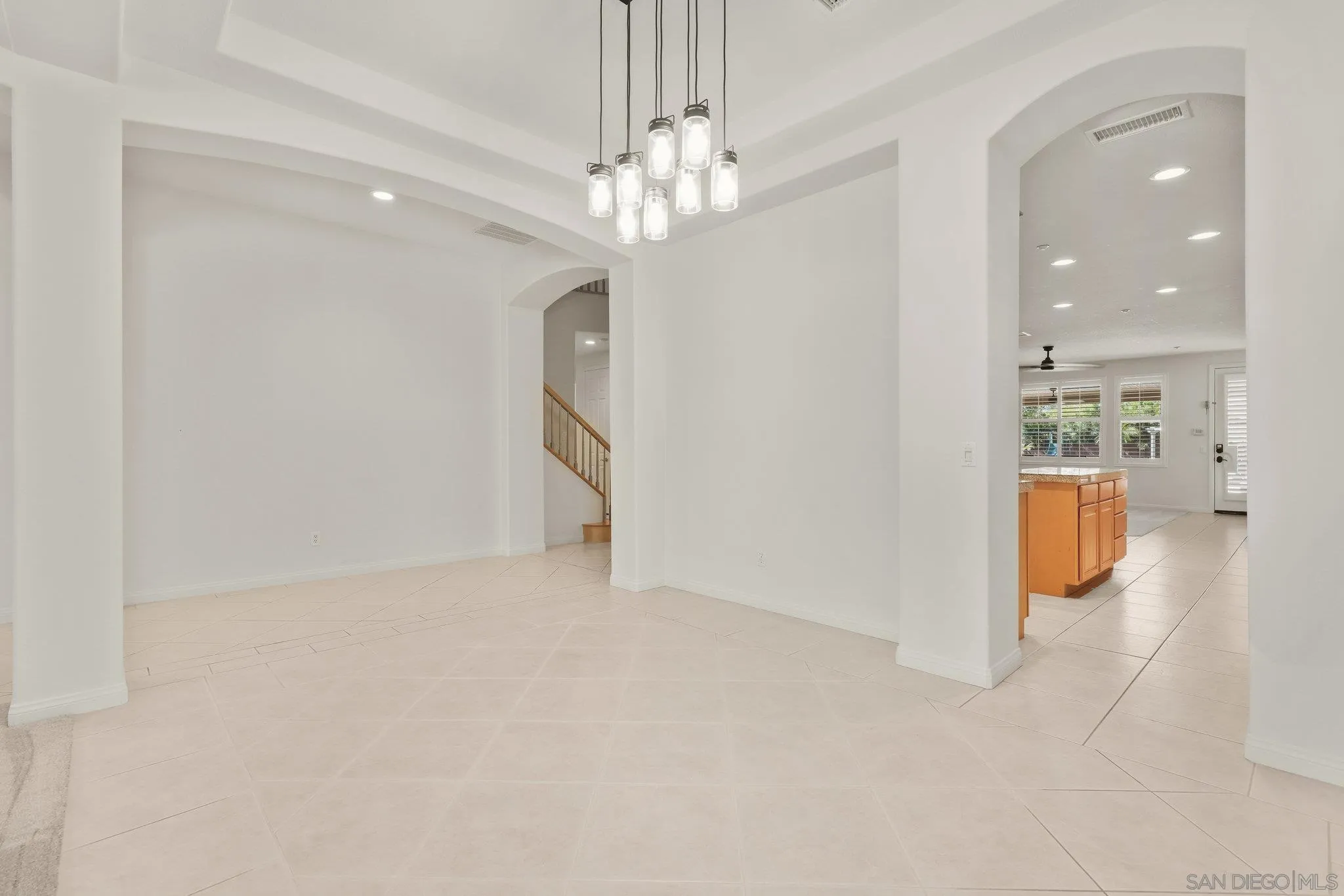 824 Hillcrest Terrace Fallbrook, CA 92028 - Photo 7 of 47 a view of a hallway with a chandelier