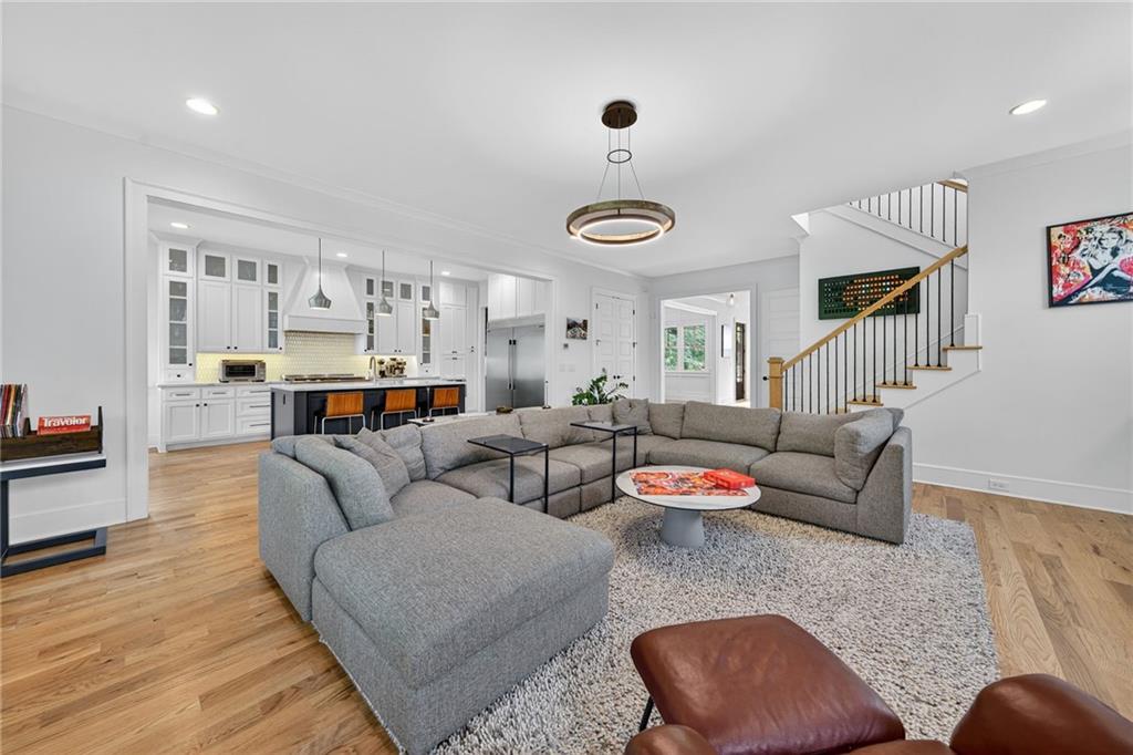 3110 Skyland Drive Northeast Chamblee, GA 30341 - Photo 6 of 43 a living room with furniture and a view of kitchen