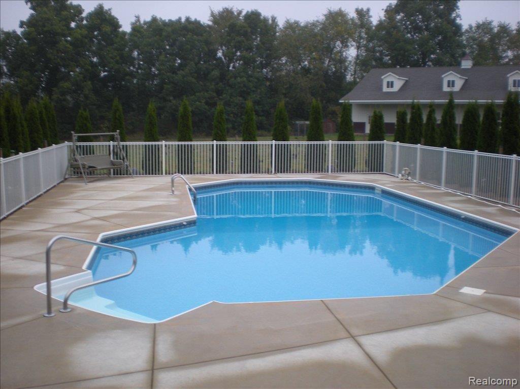 654 Gulley Road Howell, MI 48843 - Photo 3 of 24 Inground Pool