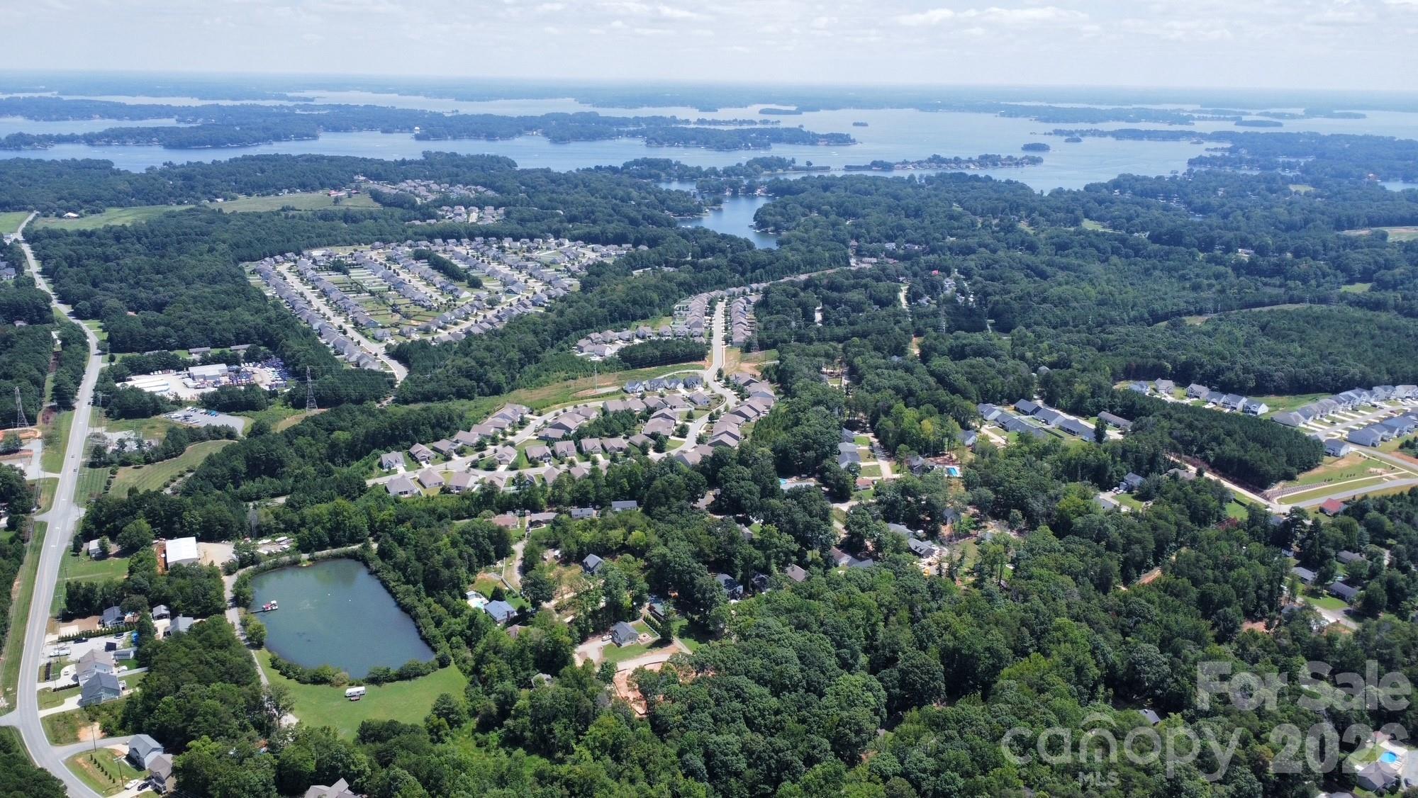 0 Enchanted Way Denver, NC 28037 - Photo 6 of 12 an aerial view of multiple house